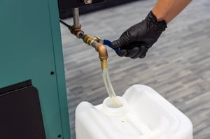 Solvent waste recycling and distillation system for hazardous waste reduction